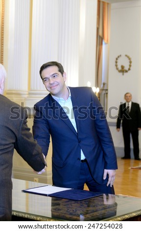 Athens, Greece, Jan. 26, 2015. Greece\'s Prime Minister Alexis Tsipras, is sworn in with a secular oath by the Greek President Karolos Papoulias at the Presidential Palace in Athens.