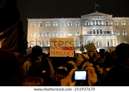 Athens Greece February 11, 2015 Protesters with signs during an anti-austerity, pro-government demonstration outside the Greek parliament on the eve of a crucial euro zone finance ministers meeting.