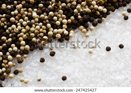 Sea salt, black and white pepper background