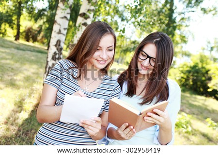 Students studying in a park