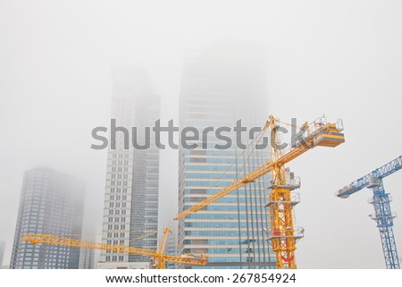 Construction site in fog, located in Qingdao City, China.
