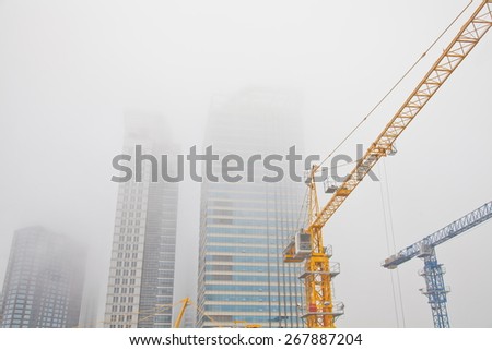 Construction site in fog, located in Qingdao City, China.