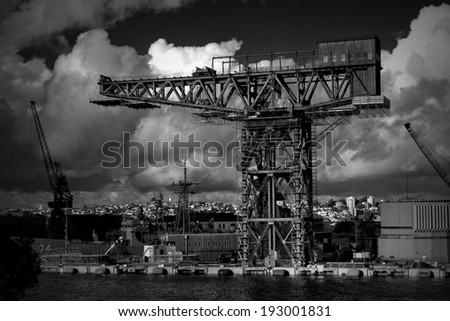 SYDNEY,AUSTRALIA - JUNE 30, 2013: The hammerhead crane at Garden Island naval base on June 30, 2013 in Sydney, Australia. Unused since 1996, A$10M has been set aside for its disposal.