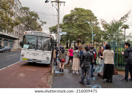 SYDNEY,AUSTRALIA - SEPTEMBER 7, 2014: A courtesy bus waits to take worshippers to Hillsong Church. Around 30,000 people attend services on its Australian campuses each week.