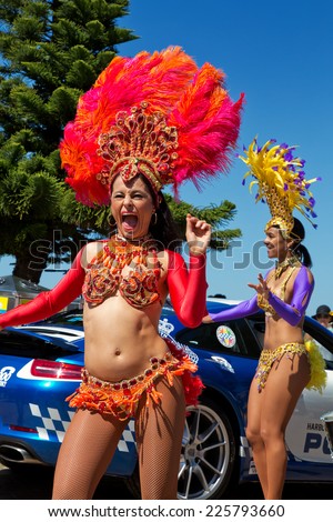 COOGEE,AUSTRALIA - SEPTEMBER 28,2014: Brazilian dancers provide entertainment at a beach soccer tournament between police and international students.