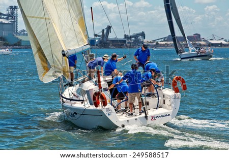 NEWCASTLE,AUSTRALIA - JANUARY 24,2015: Members of a local sailing club race their boats on the harbour. Newcastle is the 2nd city of New South Wales, after Sydney.