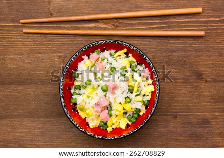 Cantonese rice on wooden table seen from above