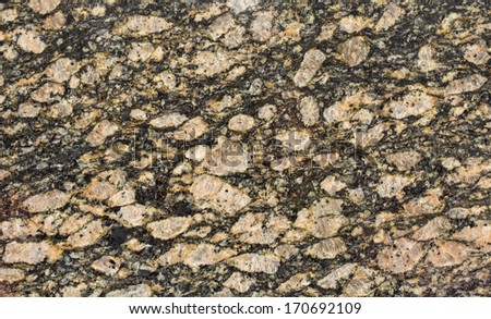 A polished granite slab background