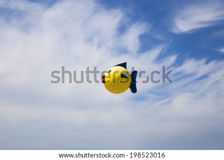 Colorful hot-air bird balloon flying
