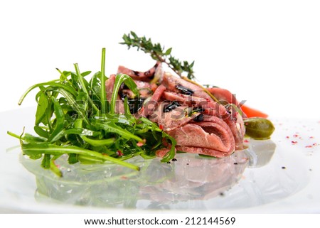 Sliced frozen meat on white background