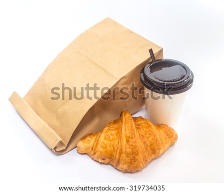 Breakfast to go,coffee and croissant with paper bag  on white background