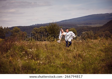 Groom and bride enjoy their wedding day
