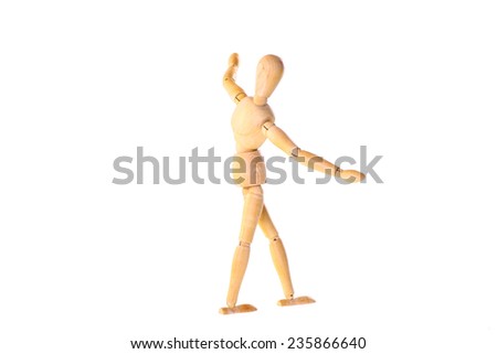 Wooden dummy in the balance - cut out