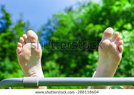 Feet are stretched in the air