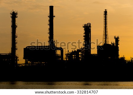 Oil refinery industry plant silhouette in the morning