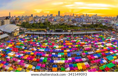 Bird eyes view of Multi-colored tents /Sales of second-hand market at twilight - Panorama picture