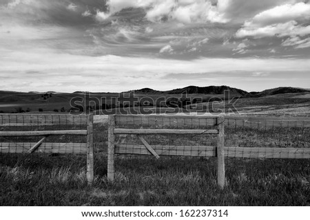 Black and White fence in the Black Hills, South Dakota, USA
