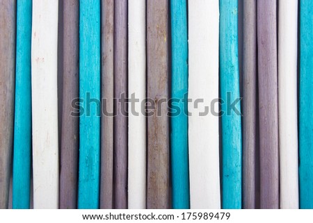 Macro of aroma incense sticks over white. colorful wooden sticks