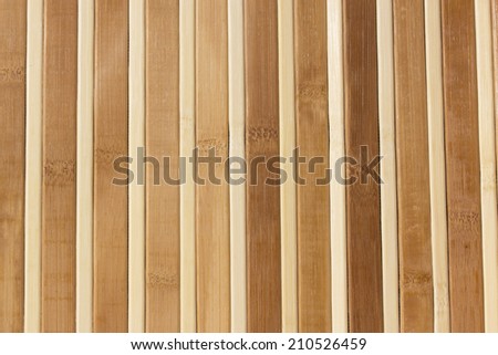 wood texture with natural patterns. Vertical wooden fence close up