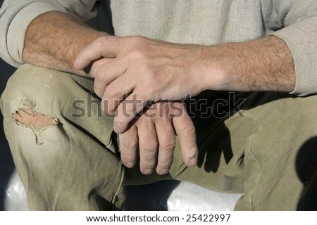 Hands, wrinkles, an old age, a dirt