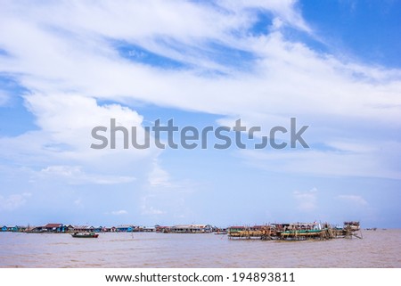 SIEM REAP, CAMBODIA - May 3: Cambodian people live beside Tonle Sap Lake in Siem Reap, Cambodia on May 3, 2014. Tonle Sap is the largest freshwater lake in SE Asia