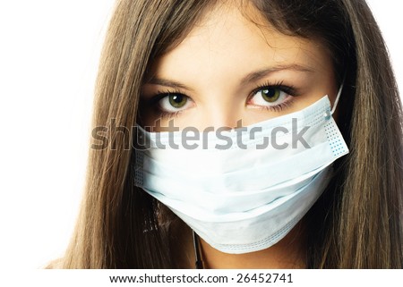 stock photo : young beautiful hospital worker wearing protective mask 