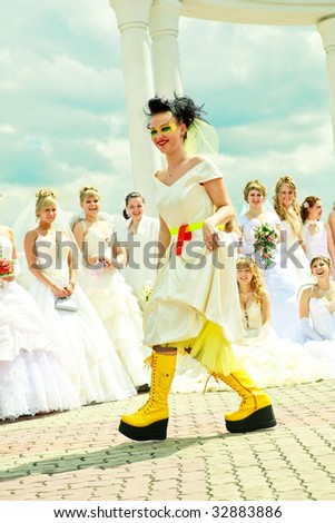 KRASNOYARSK, RUSSIA - JUNE 21: a bride with an unusual makeup and outfit at Parade of Brides June 21, 2009 in Krasnoyarsk. The annual summer event takes place in many Russian cities.