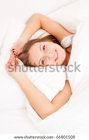 pretty  young woman  sleeping on the white linen