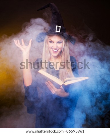 blond witch with a book and her hands and clouds of blue smoke around her conjuring, against black and yellow background