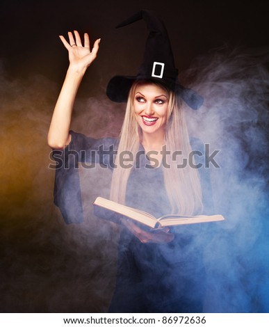 blond witch with a book in her hands and clouds of blue smoke around her conjuring, against black and yellow background