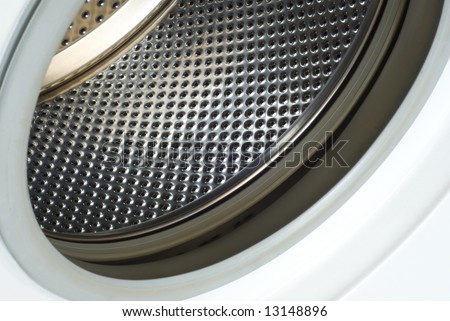 White washing machine with open door