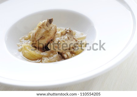 Rabbit meat with onion and potatoes ready to eat. Prepared food