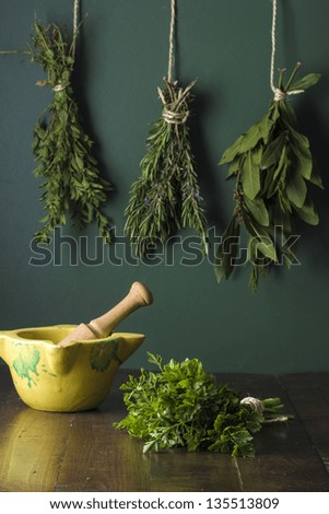 Natural herbs in a rustic kitchen