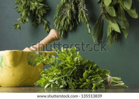 Natural herbs in a rustic kitchen