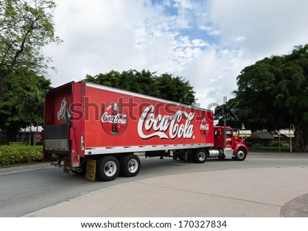 Miami, Florida. December 2, 2013. The Coca Cola Truck .The Coca-Cola Company Is An American Beverage Corporation ,It Is Known For Its Flagship Product Coca-Cola, Invented In 1886 By A Pharmacist