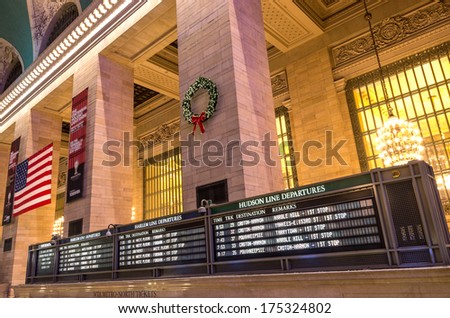 NEW YORK - DECEMBER 21, 2013: Grand Central Terminal board schedules,New York. Grand Central Terminal is the world\'s number six most visited tourist attraction