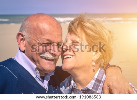 old couple in love on the beach