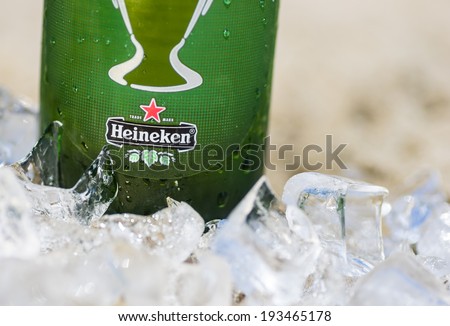 Rimini,Rivazzurra,IT. May 18,2014. Heineken beer on the beach.Heineken Lager Beer was first brewed by Gerard Adriaan Heineken in 1873.The beer is made of purified water,malted barley,hops,and yeast.