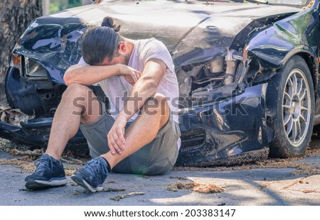 desperate man after car crash