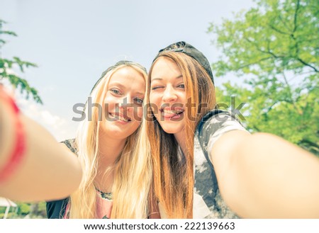 Selfie! - Two best friends taking a self portrait as memory from a travel