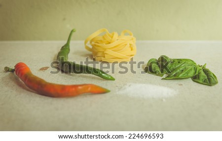 pasta minimalism. still life concept with basic ingredients for cook pasta