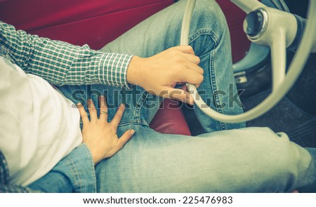woman touch his boyfriend. concept about sex in the car