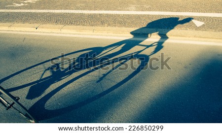 biker shadow on the street. concept about sport and healthy lifestyle