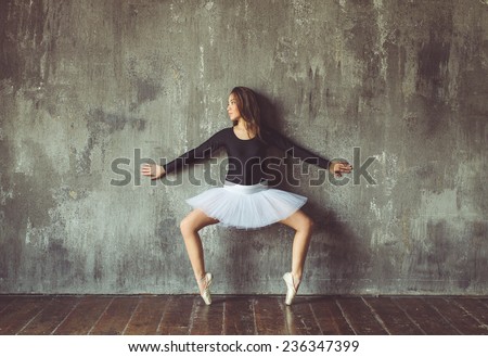 classic dancer perform position against the wall, concept about fashion and art