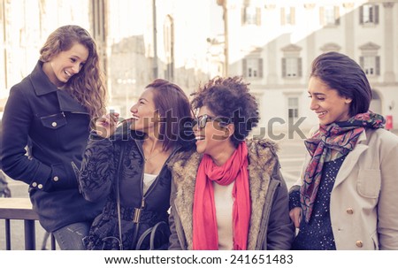 group of friends laughing and having fun together. concept of friendship