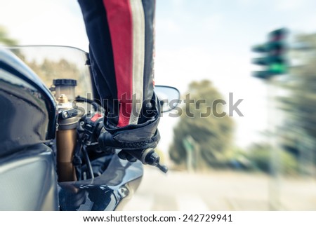 biker accelerating with his sport bike. concept about transportation