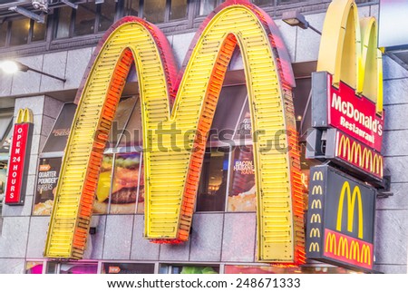 NEW YORK - DECEMBER 22, 2013: sign-logo of the chain Mc Donald\'s  in Times Square,New York.