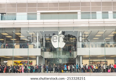 HONG KONG - FEBRUARY 13,2015: crowded Apple store in Hong Kong. Apple\'s flagship stores in China are packed with people who often line up to grab on one of the company\'s latest gadgets