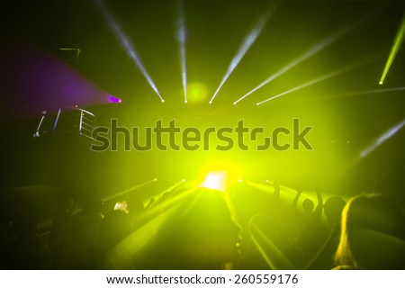 disco lights and show. Concept about entertainment and party. defocused image for an artistic touch