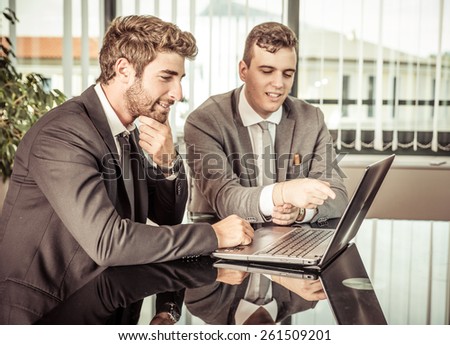 business men at work. concept about team work, finance and business. two employer working in team for a successful business plan